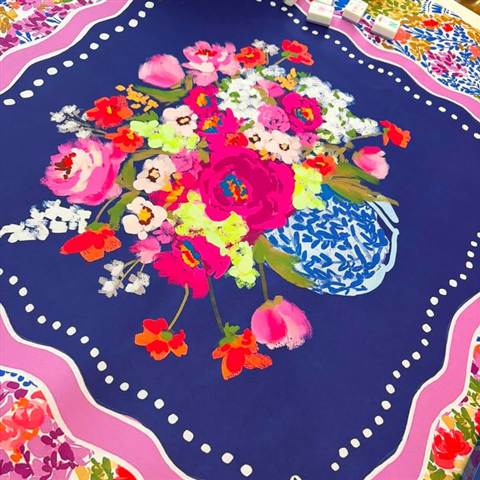 Navy mahjong mat with a bouquet design, framed by a lavender wave and floral border